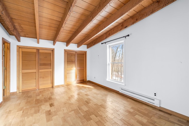 unfurnished bedroom featuring baseboard heating, light wood-type flooring, wood ceiling, vaulted ceiling with beams, and two closets