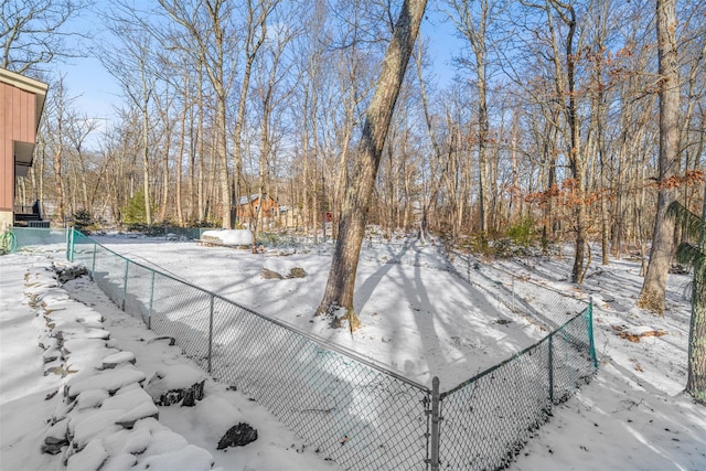 view of yard covered in snow