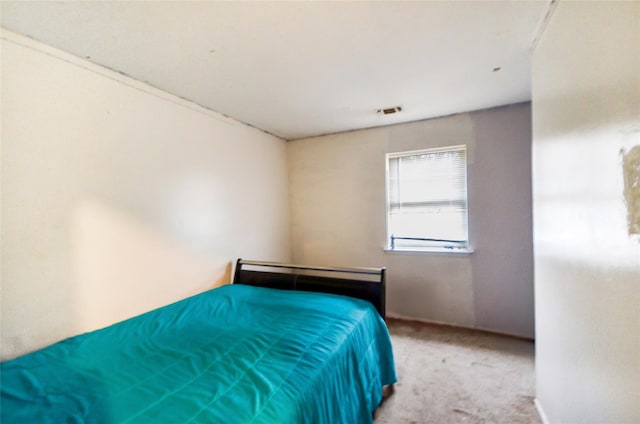 unfurnished bedroom featuring light colored carpet