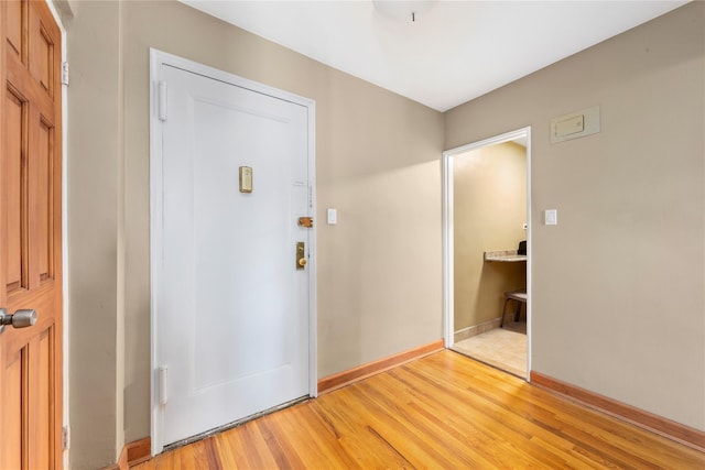 83-15 98th St Unit 6B, Woodhaven, NY 11421 - foyer entrance featuring light wood-style flooring and baseboards