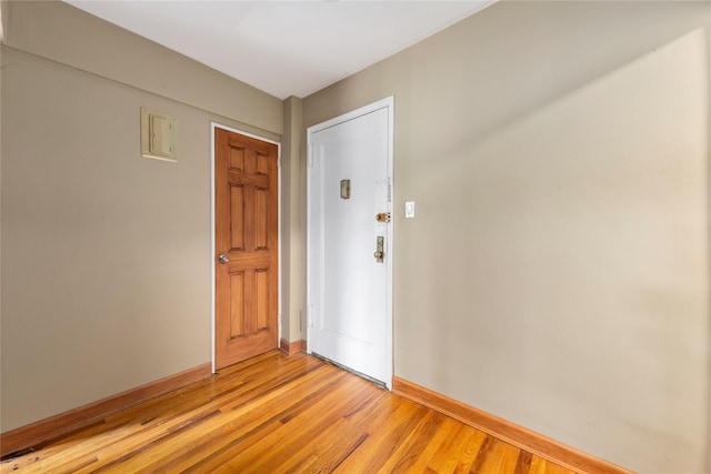 83-15 98th St Unit 6B, Woodhaven, NY 11421 - empty room with light wood finished floors and baseboards
