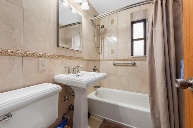 83-15 98th St Unit 6B, Woodhaven, NY 11421 - full bathroom featuring toilet, shower / bath combo with shower curtain, and tile walls