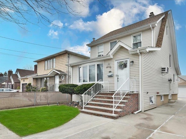 view of front of property with a front yard