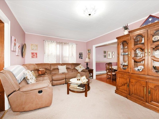 living room featuring carpet, ornamental molding, and a baseboard radiator