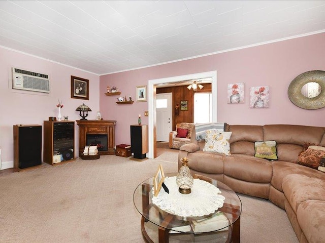 carpeted living room with a wall mounted AC and crown molding