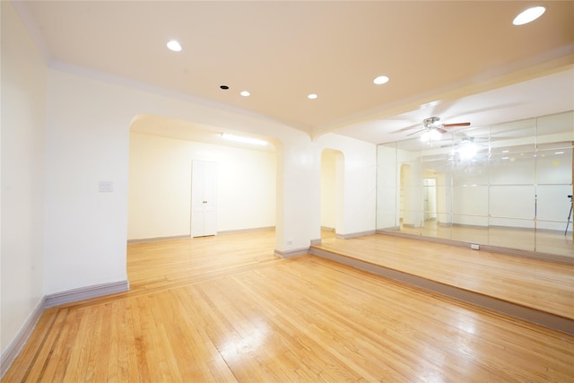 interior space with ceiling fan and light hardwood / wood-style floors