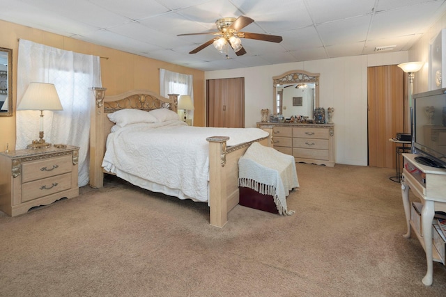 bedroom with light colored carpet and ceiling fan