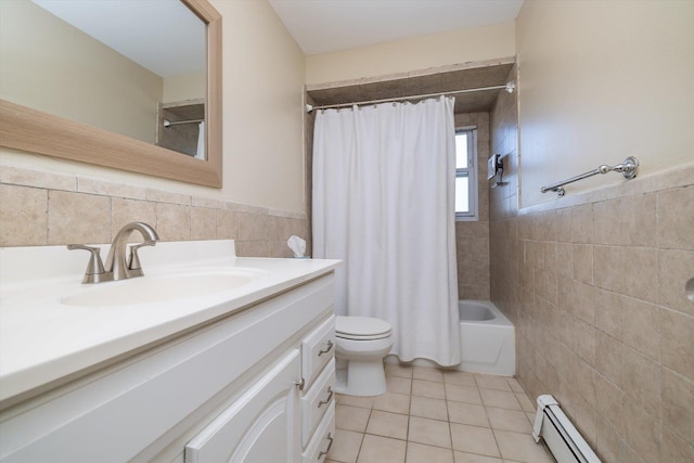 full bathroom featuring shower / tub combo with curtain, tile walls, a baseboard radiator, tile patterned floors, and vanity