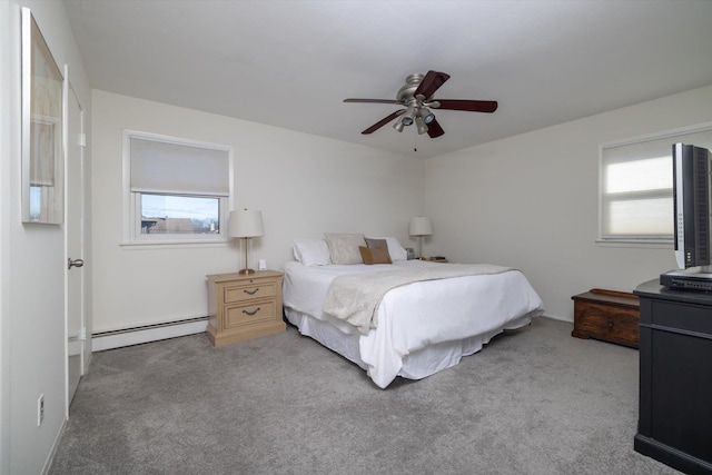 bedroom featuring ceiling fan, a baseboard radiator, and light carpet