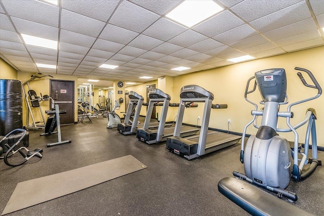 gym featuring a drop ceiling