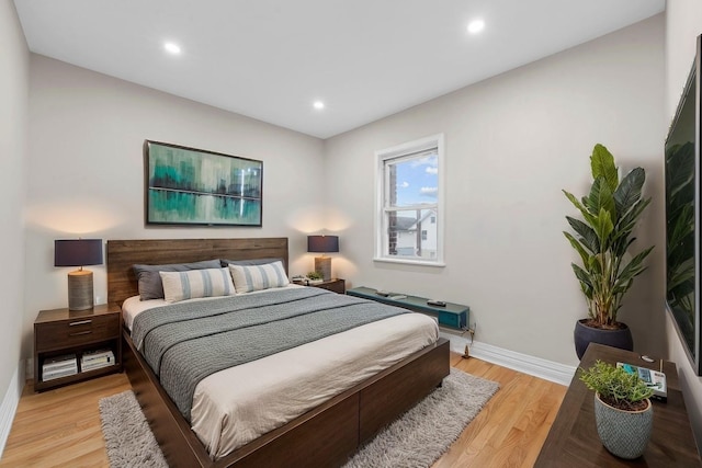 bedroom featuring light wood-type flooring