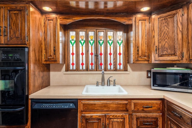 kitchen featuring sink and dishwasher