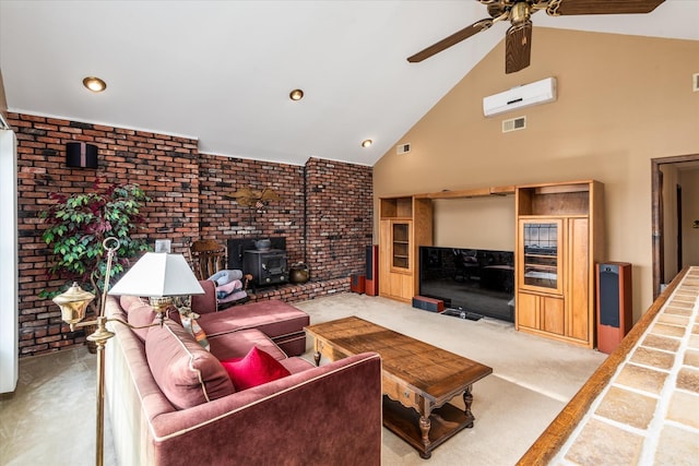 carpeted living room with high vaulted ceiling, a wood stove, and ceiling fan