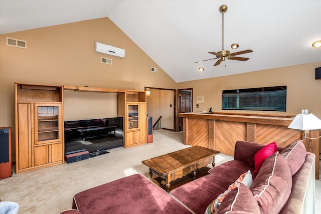 carpeted living room with high vaulted ceiling and ceiling fan