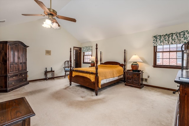 carpeted bedroom featuring ceiling fan and vaulted ceiling