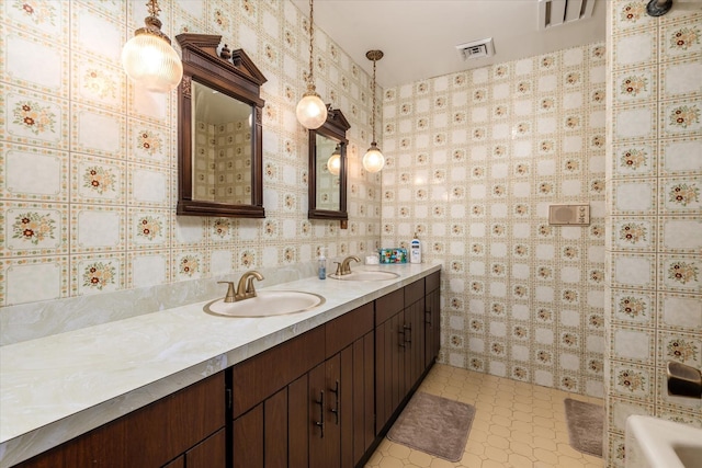 bathroom featuring vanity and tile patterned flooring