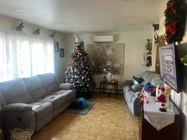 living room with an AC wall unit and light parquet flooring