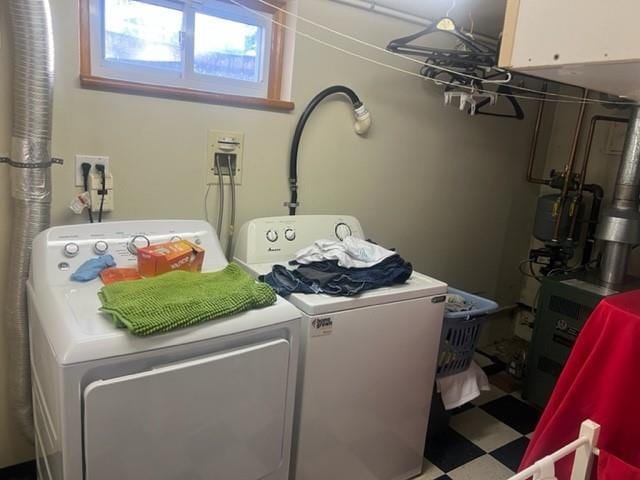 laundry room with washer and dryer