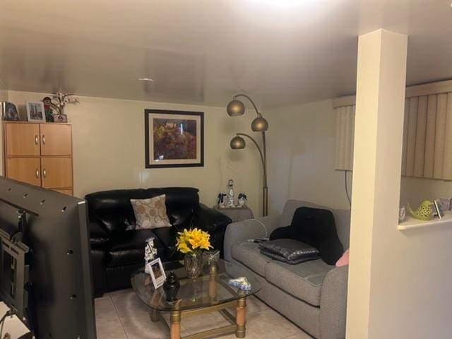 living room featuring light tile patterned flooring