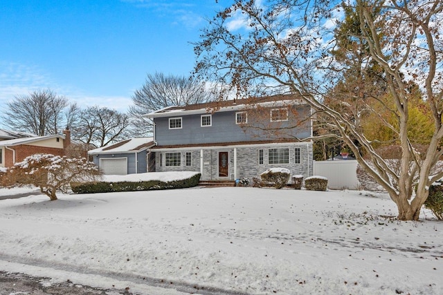 front of property with a garage