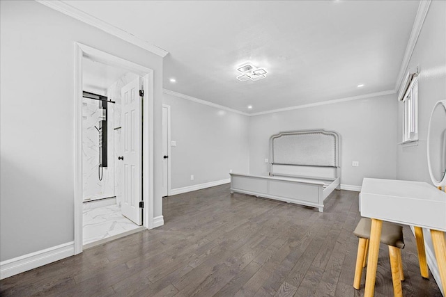 unfurnished bedroom featuring ensuite bathroom, ornamental molding, and dark hardwood / wood-style flooring