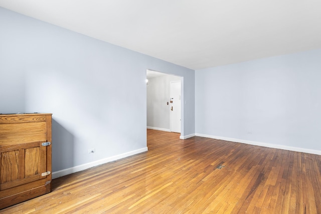 unfurnished room featuring light hardwood / wood-style floors