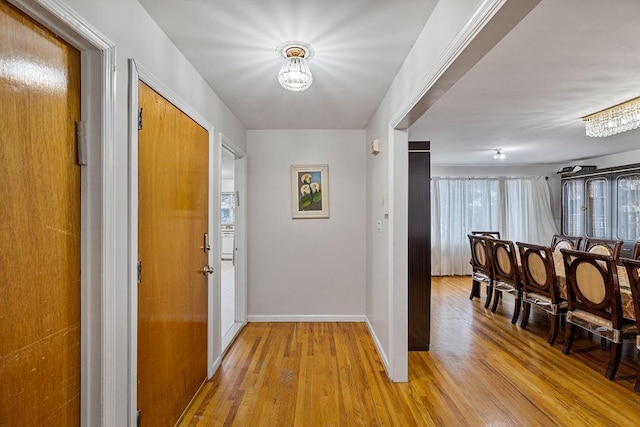 hallway featuring light hardwood / wood-style floors