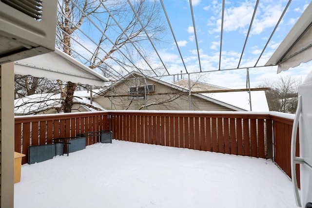 view of snow covered deck