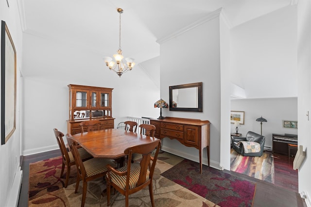 dining area featuring crown molding, lofted ceiling, dark wood-type flooring, and an inviting chandelier