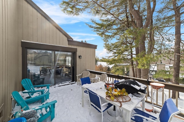 view of snow covered deck