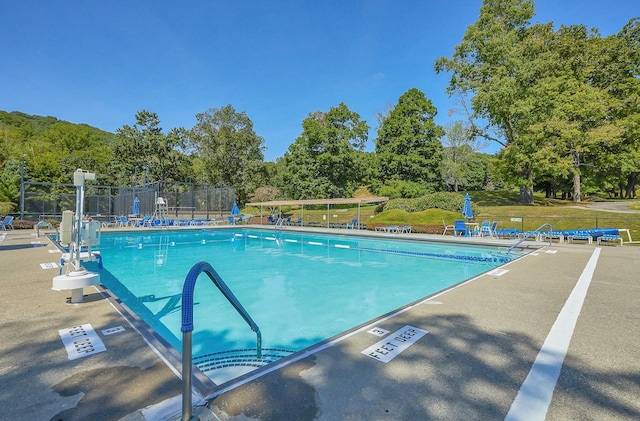 view of pool featuring a trampoline