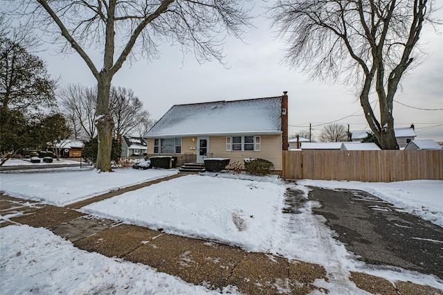 view of snow covered property