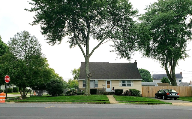 view of front of home with a front yard