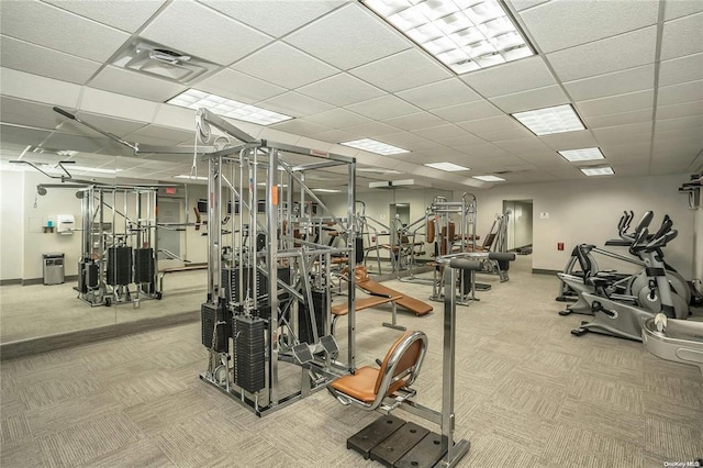 gym with carpet and a drop ceiling