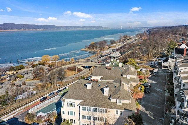 bird's eye view featuring a water and mountain view