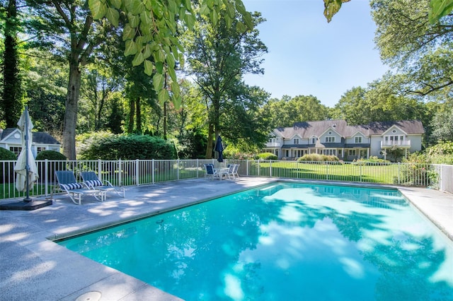 view of pool featuring a patio area