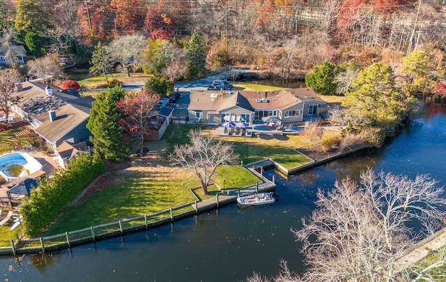 bird's eye view with a water view