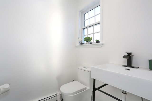 bathroom featuring sink and toilet