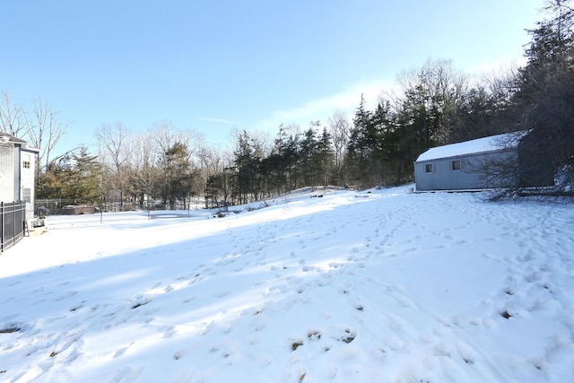 view of yard covered in snow