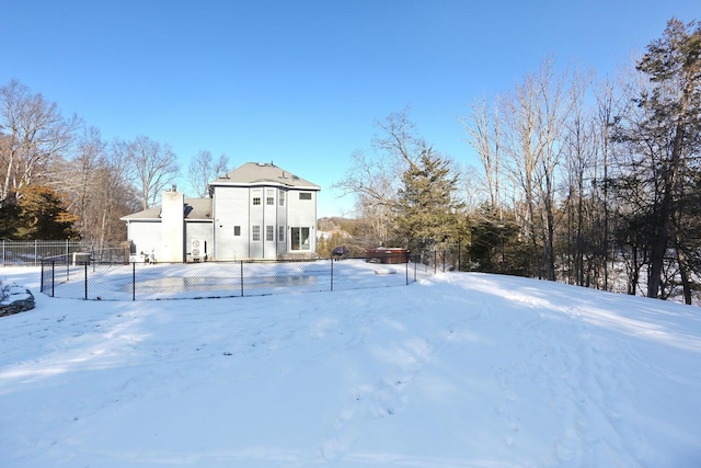 view of yard covered in snow