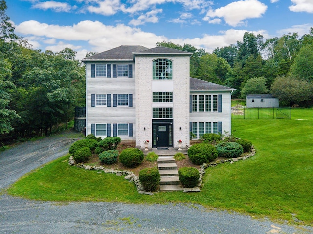 view of front of home with a front yard