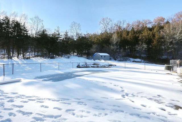 view of yard covered in snow