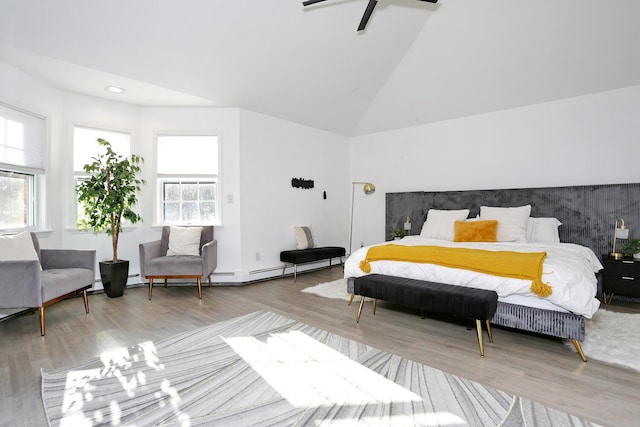 bedroom featuring wood-type flooring, high vaulted ceiling, and a baseboard radiator