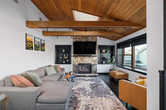 living room with wood-type flooring, wooden ceiling, a fireplace, and track lighting