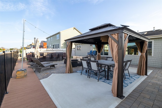 view of patio / terrace featuring a gazebo and an outdoor hangout area