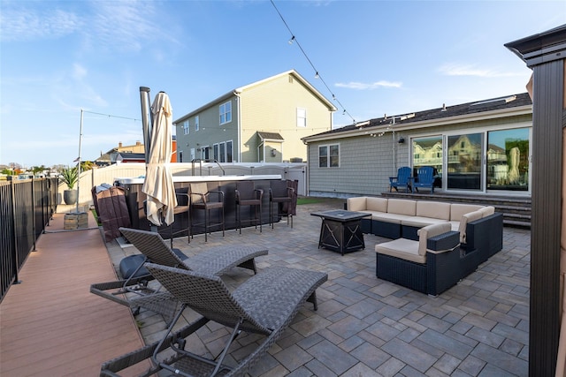 view of patio with an outdoor hangout area and an outdoor bar