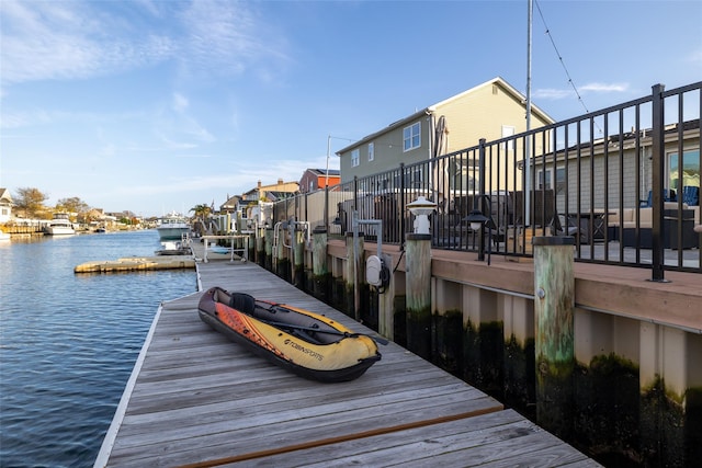 dock area with a water view