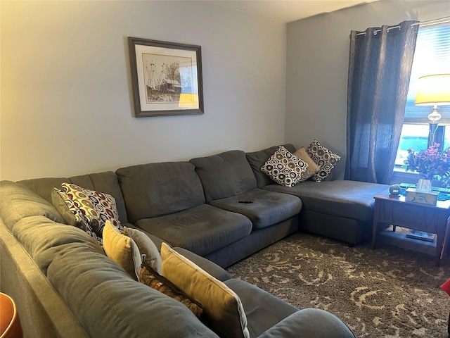 living room featuring dark carpet