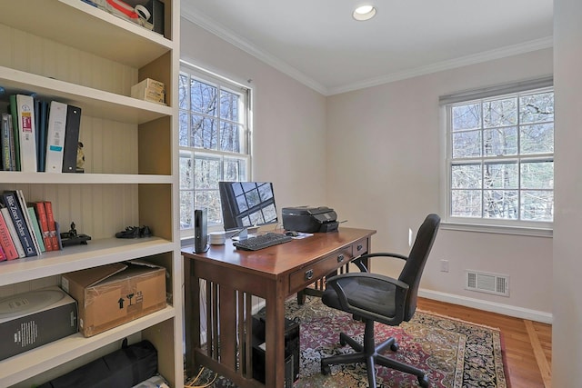 home office featuring crown molding and wood-type flooring