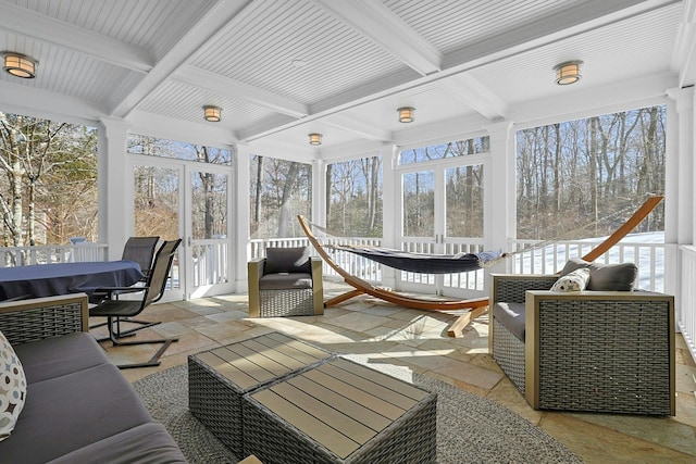 sunroom / solarium with coffered ceiling and beam ceiling